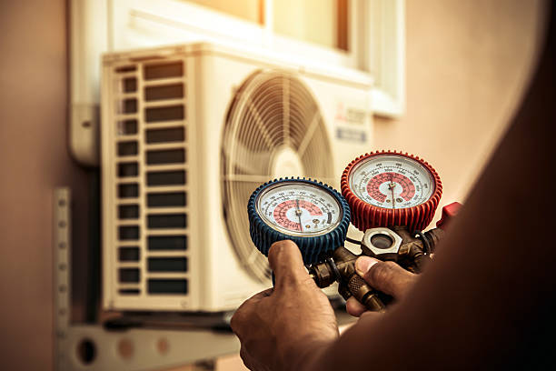 Professional Air Conditioning Service technician working in Glenmont, NY